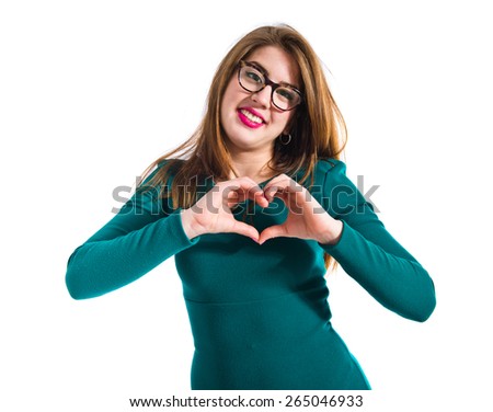 Girl making a heart with her hands 
