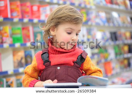 Little girl in bookshop