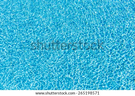 The water in the pool plays a in the sun