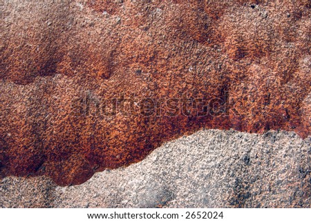 Background of Water-sculpted Granite with Orange and Grey Tones
