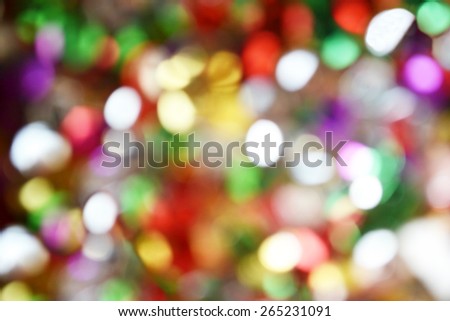Bright and abstract blurred colorful rainbow background with shimmering glitter