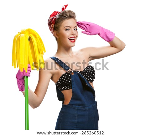 Attractive woman wearing pink rubber protective gloves holding cleaning mop. Photo of young beautiful American pin-up girl isolated on white background. Cleaning service concept