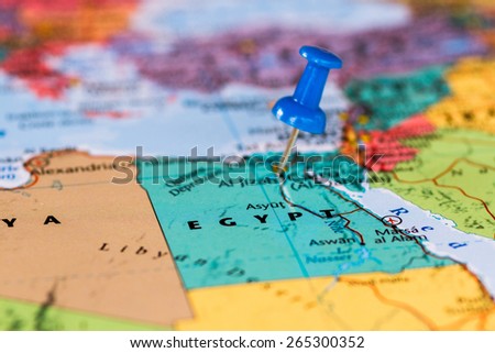 Map of Egypt with a blue pushpin stuck Royalty-Free Stock Photo #265300352