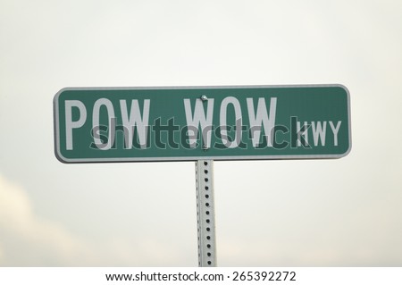 Road sign for Pow Wow Highway representing American Indians in South Dakota