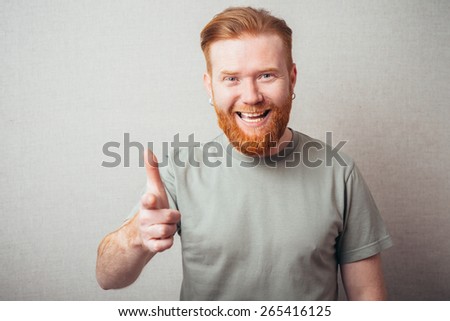 bearded man pointing to you