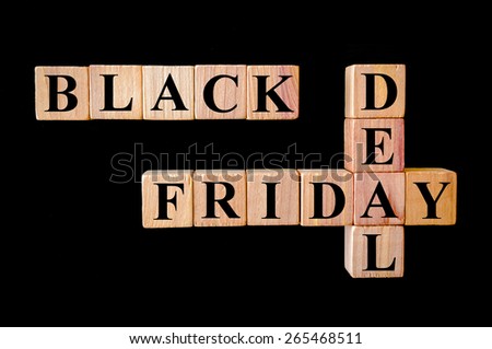 Black Friday Deal.Retail Sales concept image.Wooden small cubes with letters forming crossword puzzle isolated on black background.