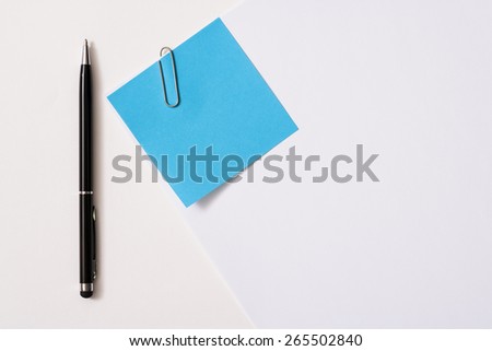 Blank paper memo with clip on white background