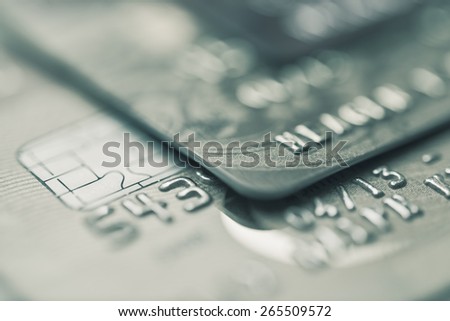 Split toned macro image of credit cards  Royalty-Free Stock Photo #265509572