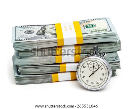 Time is money concept  - stopwatch and stack of new 100 US dollars 2013 edition banknotes (bills) bundles isolated on white
