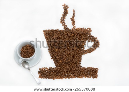 Coffee cup and steam made from beans, grain. Isolated on white background