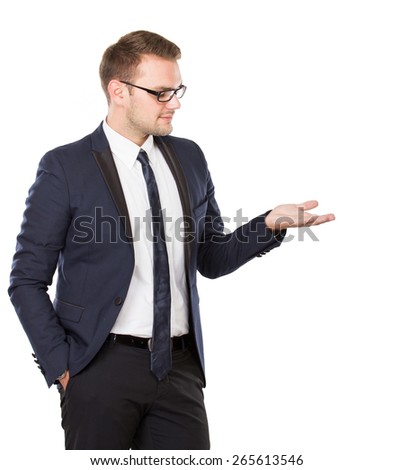 A portrait of a young businessman take something on his hand, concept isolated
