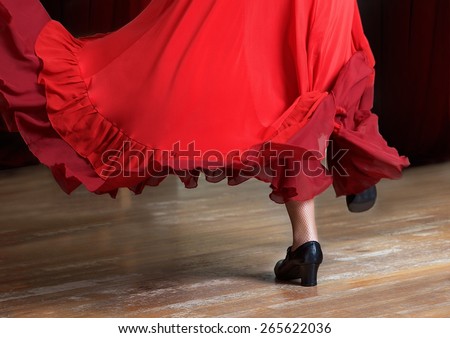 Photo of flamenco dancer. Legs fragment photo of spanish flamenco dancer.  Only legs cropped Royalty-Free Stock Photo #265622036
