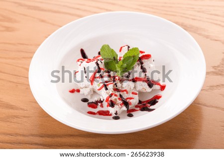 Ice cream dessert isolated on wooden background
