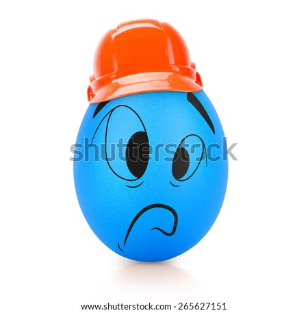 Blue sad egg with emotional face in construction helmet