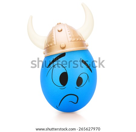 Blue sad egg with emotional face in Viking helmet