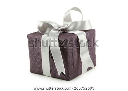 Gift box with silver bow isolated on white