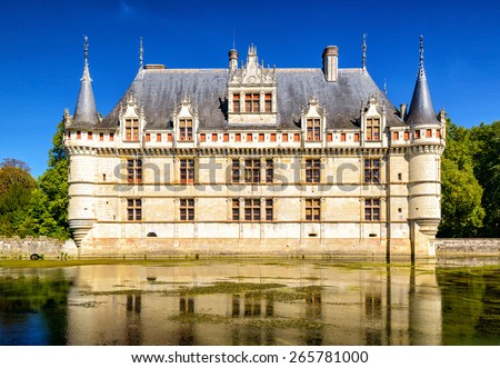 Chateau d'Azay-le-Rideau in summer, France. This Renaissance castle is landmark of Loire Valley. Scenic view of the French chateaux and water. Beautiful old palace or vintage mansion. Travel theme.