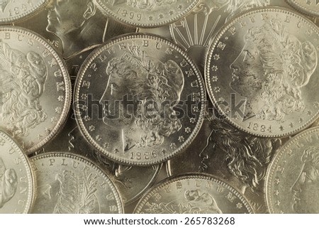 Vintage concept of old silver coins with filled frame. 