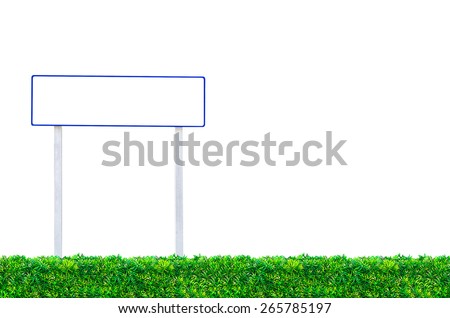 Signs for writing text on green grass.