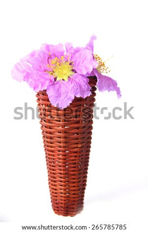 flowers in a wooden vase