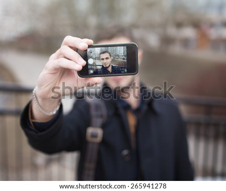 beautiful stylish brutal hipster guy selfie