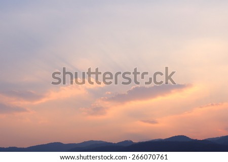 sunset sky with beam of light in evening