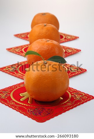 row of the mandarin oranges on the red banner