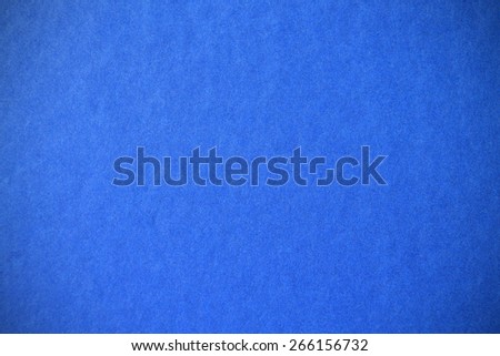 vignette of blue paper texture used as background