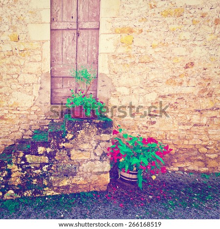 Porch Decorated with Flowers in the French City, Vintage Style Toned Picture