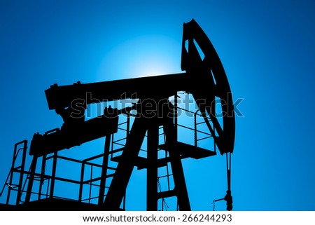 Oil pump on background of blue sky