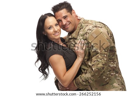 Happy army man with his wife against white background