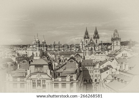 Aerial view: Houses with traditional red roofs in Prague. Prague (Praha) is capital, largest city of Czech Republic and historical capital of Bohemia. Prague situated on Vltava River. Antique vintage.