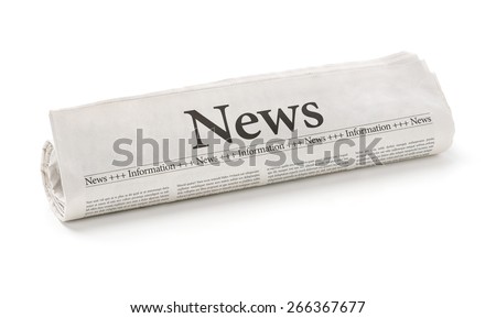 Rolled newspaper with the headline News Royalty-Free Stock Photo #266367677