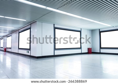 Blank billboard on the wall in airport  corridor
