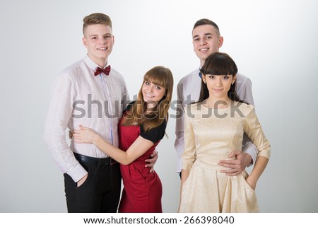 Group of young friends. Happy group of friends isolated over white. 2 couples