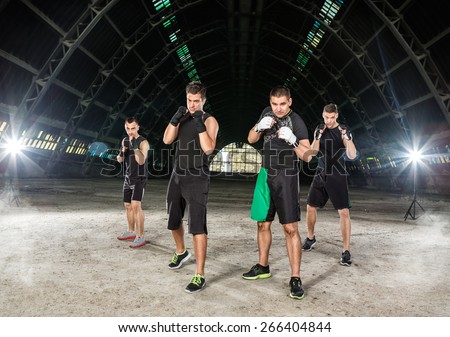group of young men on kick box training