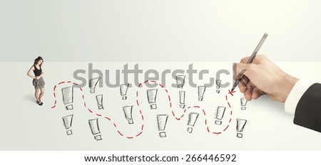 pensive businessman in front of hand drawn labyrinth