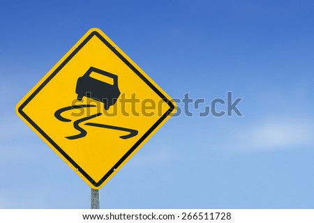 Slippery when wet icon yellow road sign on sky background