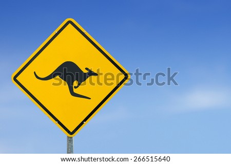 caution kangaroo icon yellow road sign on sky background