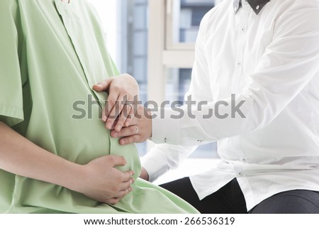 The couple is happy because of a future child