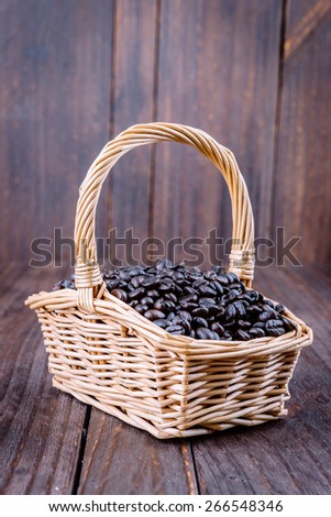 Coffee beans on wooden background - vintage effect style pictures