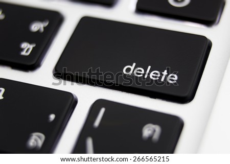 Delete key on keyboard close up Royalty-Free Stock Photo #266565215
