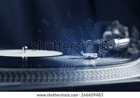 Turntable playing music with hand drawn cross lines concept on background