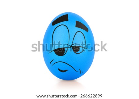 Blue sad egg with emotional face isolated