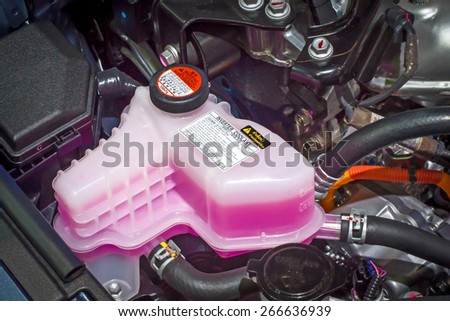 Coolant tank and warning information. Royalty-Free Stock Photo #266636939