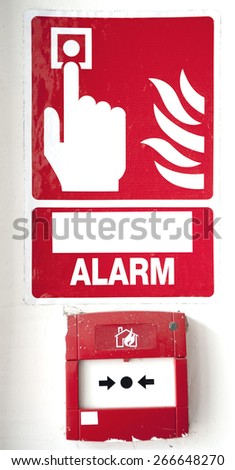 fire alarm box on cement wall for warning