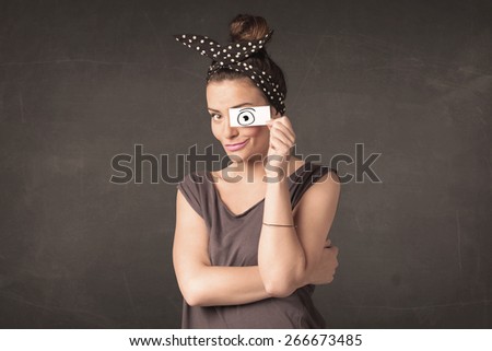Funny woman looking with hand drawn paper eyes concept