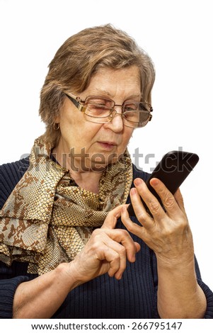 Pensioner woman with two pair of glasses dealing cell phone on white background. Retirement and call your parents concept.