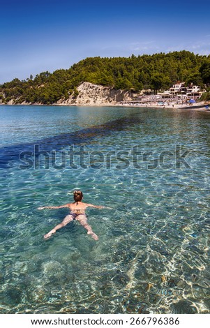 Woman relaxing in sea