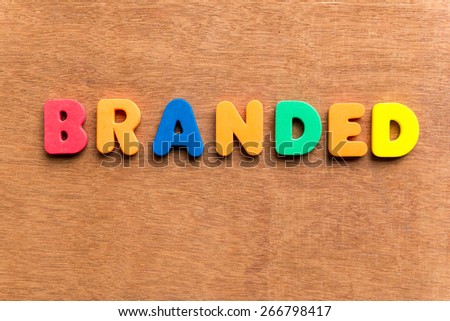 branded colorful word on the wooden background